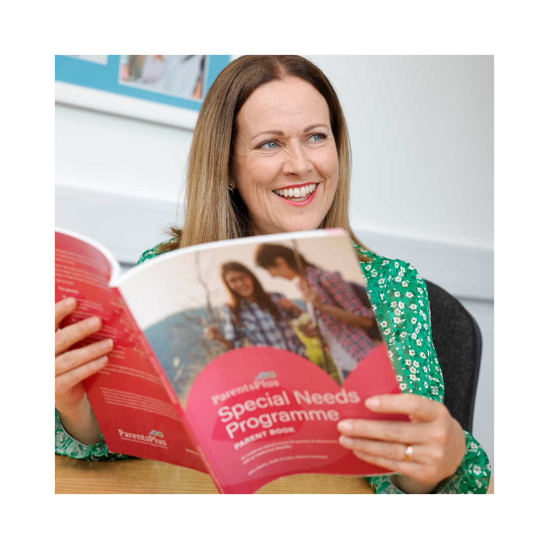Image of Ciara from parents plus holding a copy of the Special needs programme. A professional parenting programme for parents of a child with addition educational needs.